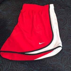 Red Nike shorts